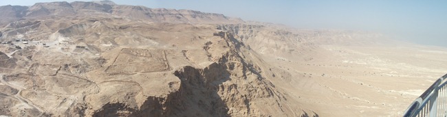 The view of the Judean Desert and Dead Sea from the top level of the Northern Palace. The large dirt squares are the outlines of the Roman encampments. These completely surrounded Masada, along with a siege wall.