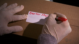 Louis mails Dexter the Ice Truck Killer Hand. That doesn't bode well for Dexter!