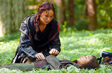 Katniss' impromptu funeral for Rue is the beginning of the End for the Capitol.