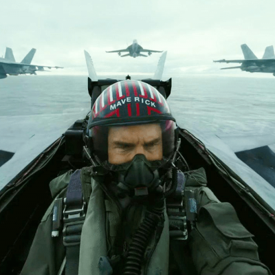 Tom Cruise as Pete 'Maverick' Mitchell in a fighter jet cockpit
