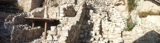 The walls of the City of David. The section of wall to the right of the strip that sticks out down the middle of the picture dates back to the Jebusites, so pre-1000 BCE.