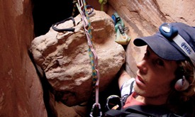 Ralston again, pinned to the canyon wall by the boulder, and sitting in a sling he fashioned out of his climbing ropes.